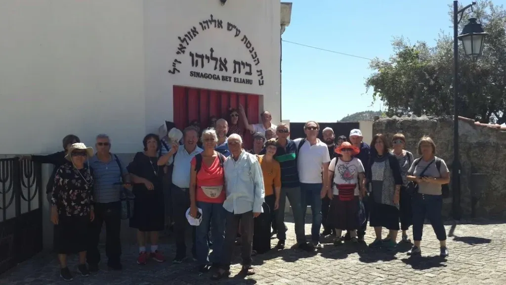 Tour Group in front of Belmonte Portugal Synagogue