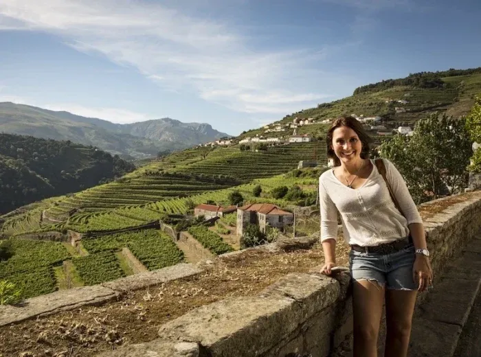 Douro Valley Vineyards with a smiling traveller