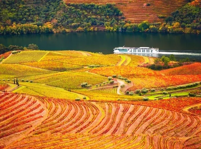 Scenic view of a historic Portuguese village and surrounding hills on a Jewish heritage route between Belmonte and the Douro Valley.